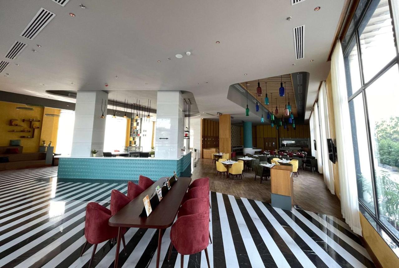 Ramada Encore By Wyndham Amritsar Airport Экстерьер фото